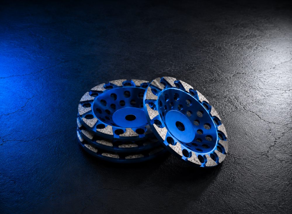Diamond cup wheels product set on a dark textured surface