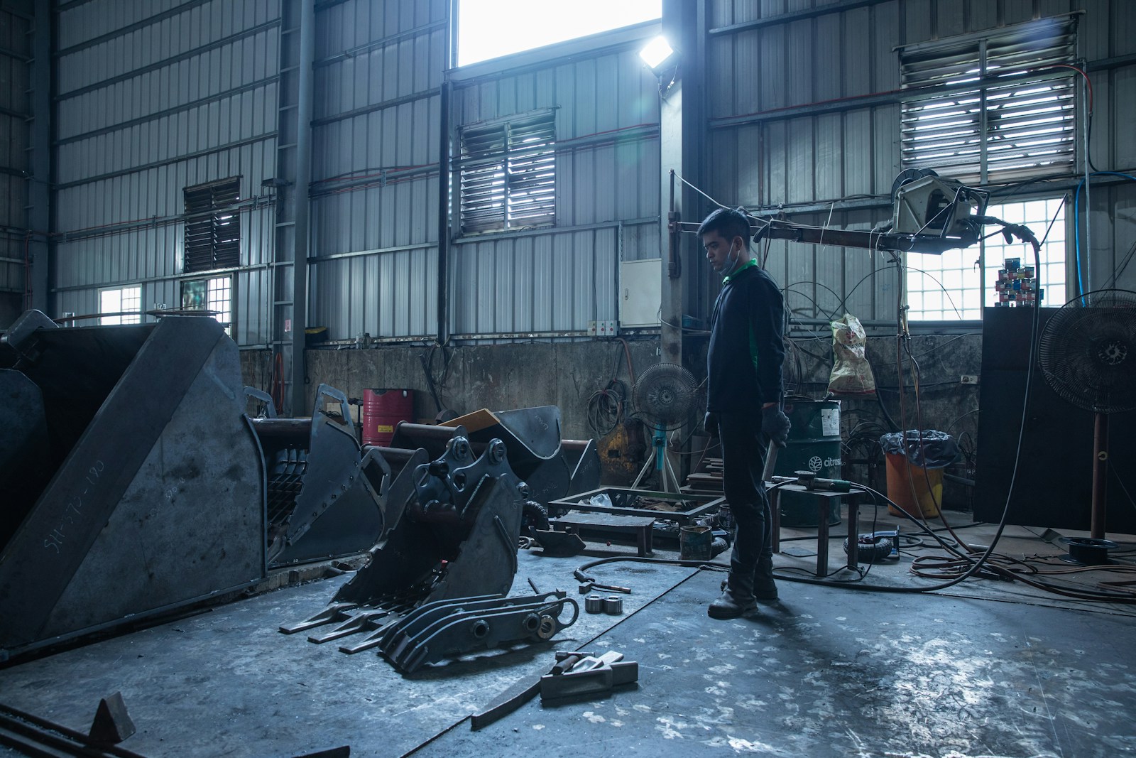 Industrial workshop with machinery and tools for construction supply operations