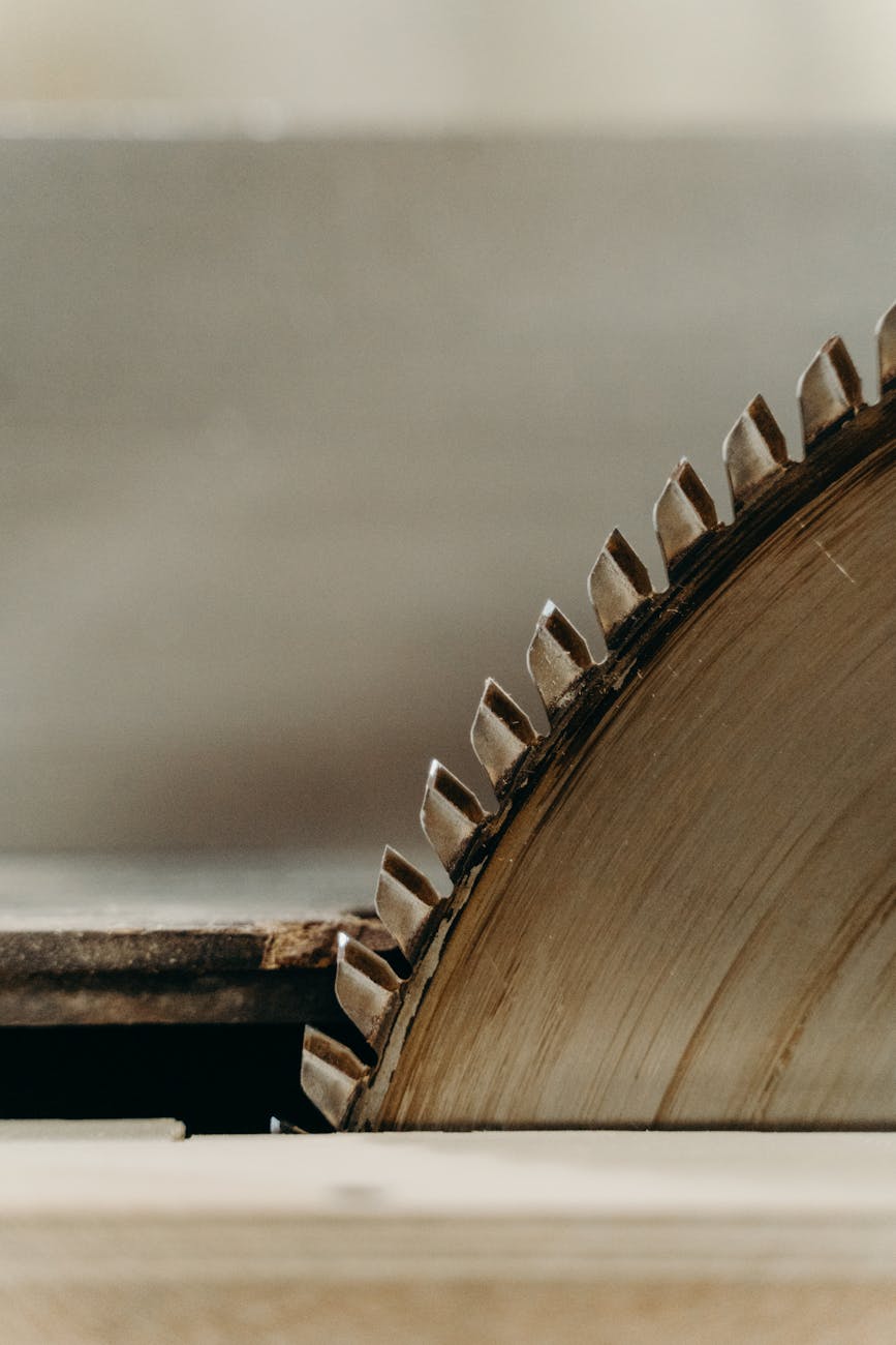 Detailed close-up shot of a sharp circular saw blade in motion